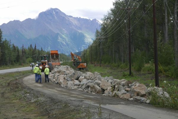 Alaska Department of Transportation crews stage Armour Rock to be installed along the Old Glenn Highway. (Photo by Patty Sullivan/Mat-Su Borough Public Affairs)