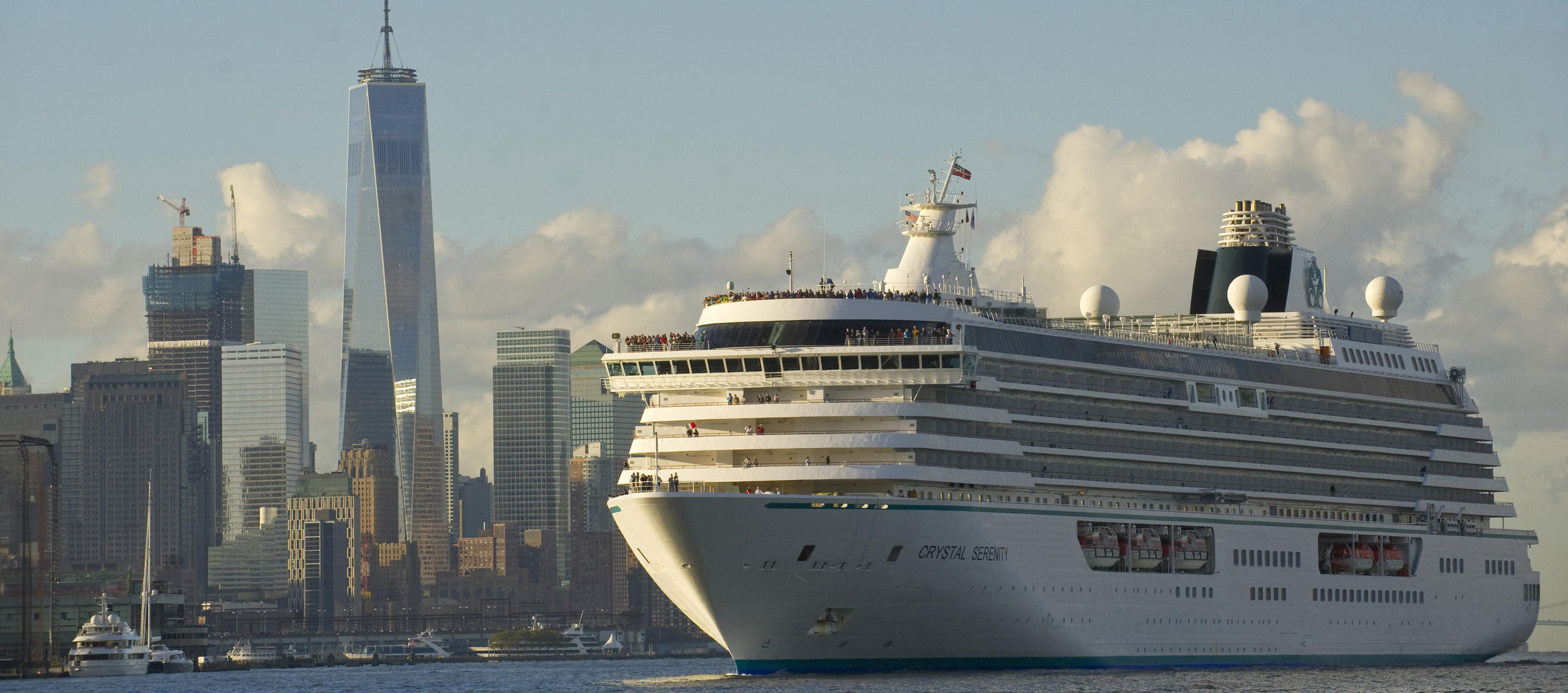 With the Freedom Tower looming in the background, the Crystal Serenity pulls into New York Harbor on Sept. 16, at the end of a 32-day cruise around Alaska and through the Northwest Passage. (Photo courtesy ofCrystal Cruises)
