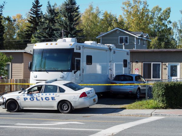 A police crime lab parked outside a duplex at 506 W. 15th Avenue not far from Downtown Anchorage. Photo: Zachariah Hughes, Alaska Public Media - Anchorage.