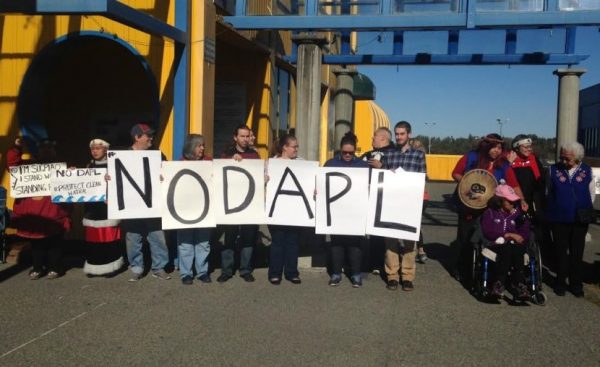 Demonstrators in downtown Anchorage protest the Dakota Access pipeline (photo by Elizabeth Harball/Alaska Public Media)
