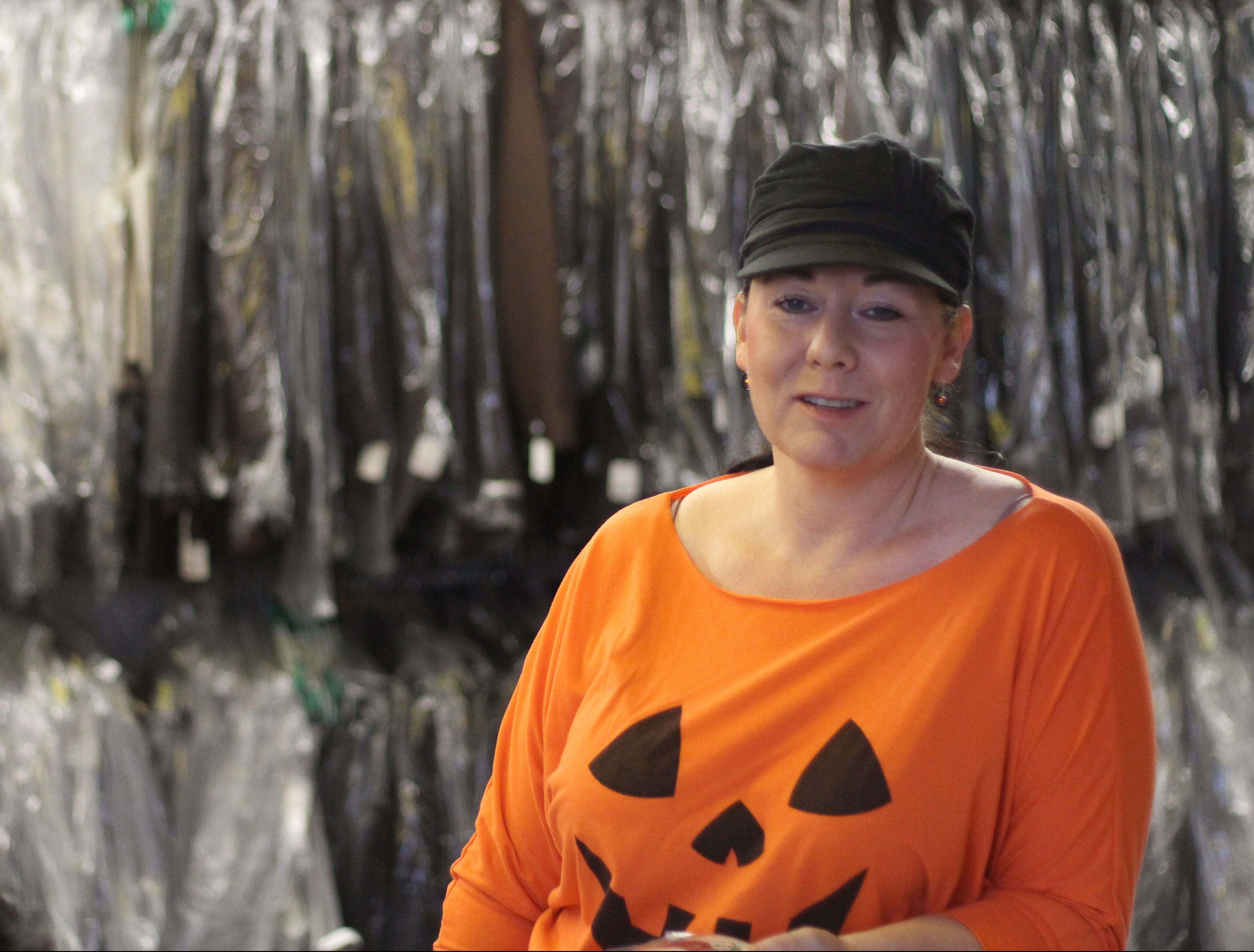 Starla Heim, the owner of Dooleys Tuxedos and Costumes Photo by Wesley Early, Alaska Public Media - Anchorage)