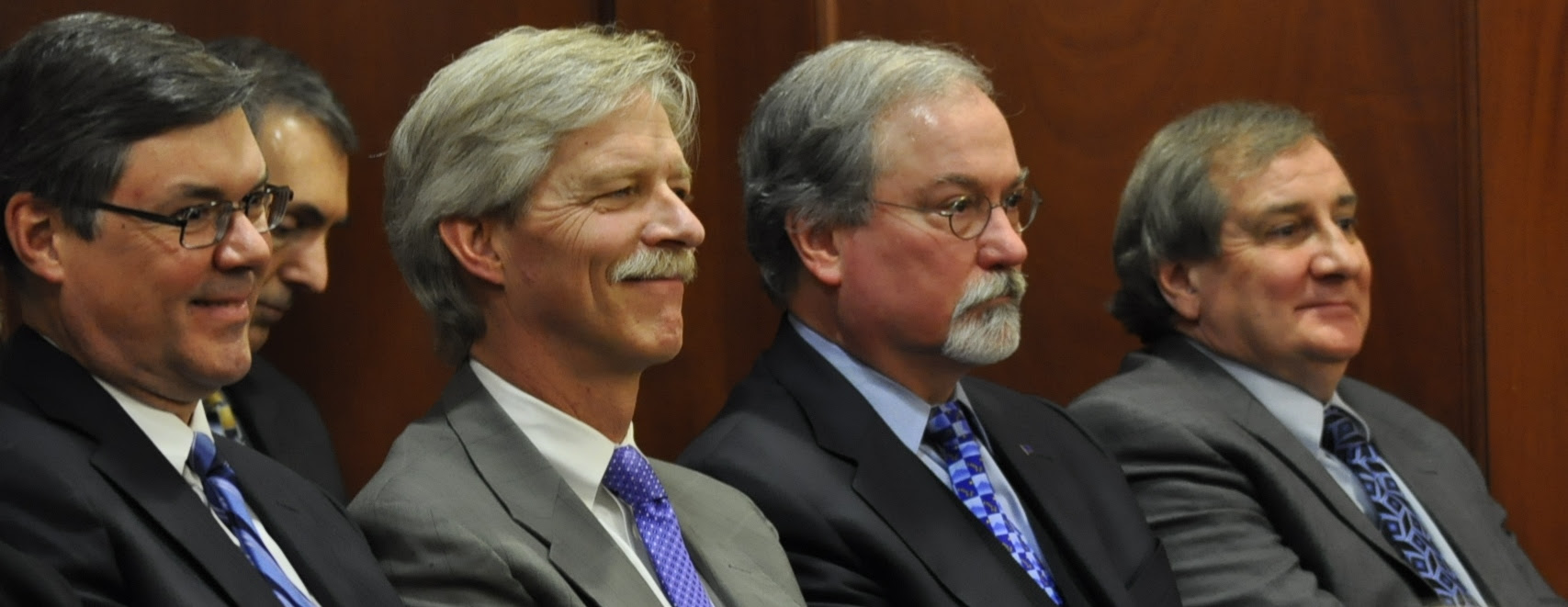 Alaska Supreme Court Justices Joel H. Bolger, Peter J. Maassen , Craig Stowers and Daniel E. Winfree (left to right), listen as then-Chief Justice Dana Fabe delivers the 2014 State of the Judiciary Address. Bolger and Maassen face judicial retention elections. (Photo by Skip Gray, Gavel Alaska)