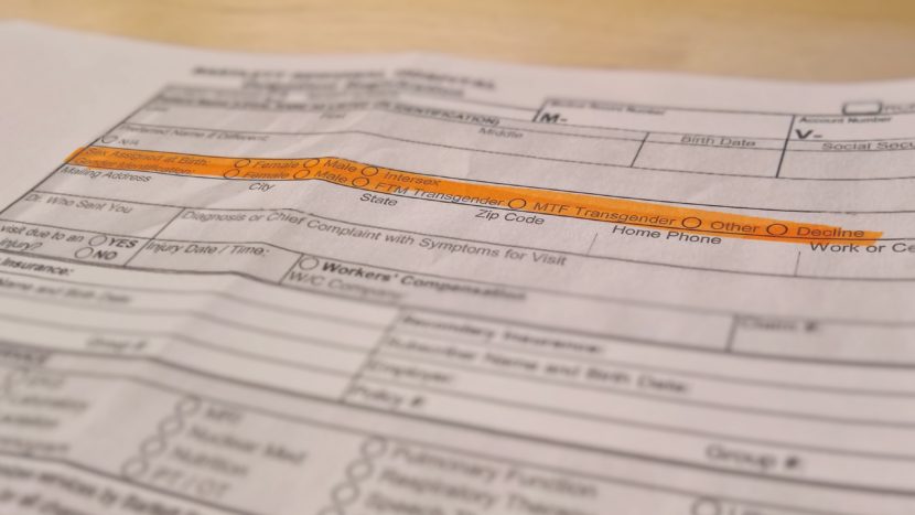 A copy of Bartlett Regional Hospital’s new outpatient registration form asks for sex assigned at birth and gender identification with expanded options. (Photo illustration by Jeremy Hsieh, KTOO - Juneau)