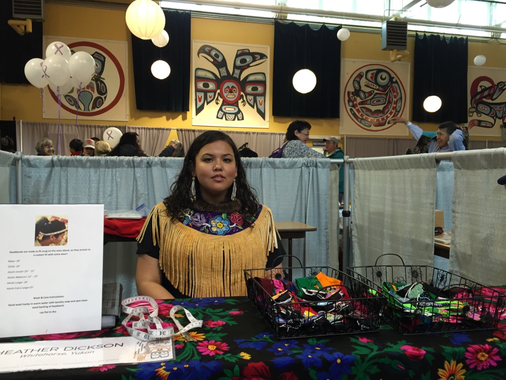 In less than a year, Whitehorse beader Heather Dickson has developed a booming online business, Dickson Design. It began when she converted floral handkerchiefs - worn by elders in the Yukon - into beaded headbands. (Emily Kwong/KCAW photo)