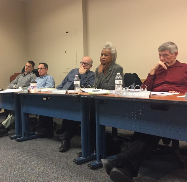 Members of the Assembly's committee on homelessness listen to reports from different non-profit partners on Wednesday, December 14th, 2016. (Photo: Zachariah Hughes, Alaska Public Media - Anchorage)