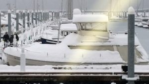 Boats in Seward's harbor are covered in snow after the community received more than two feet over the weekend. (Photo courtesy the City of Seward)