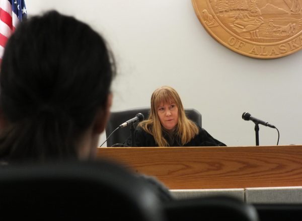 District Court Judge Kirsten Swanson presides over her first case in December 2016. Swanson and other Alaska judges started using new pretrial risk scores this month. (Photo by Matt Miller/KTOO)