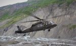 Blackhawk helicopter landing on Colony Glacier (Emily Russell/Alaska Public Media)