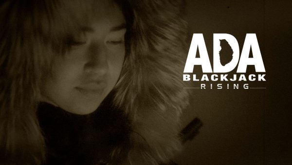 A faint image of a woman's face ringed by the fur ruff on her parka next to lettering of the film's title, "Ada Blackjack Rising," with the space inside the D made to look like the oblong Gambel Island