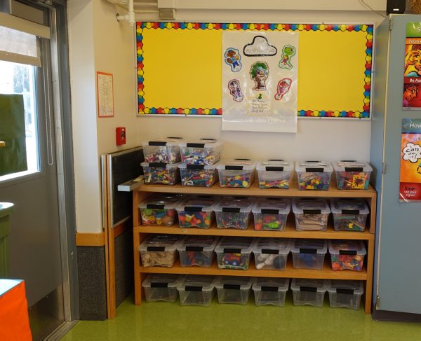 Huffman Elementary kindergarten teacher Katie McDaniel has sorted her classroom’s toys into separate containers, one for each student.