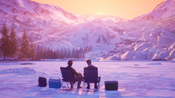 Two people sit in lawn chairs on a lake looking at a sunset in the mountains