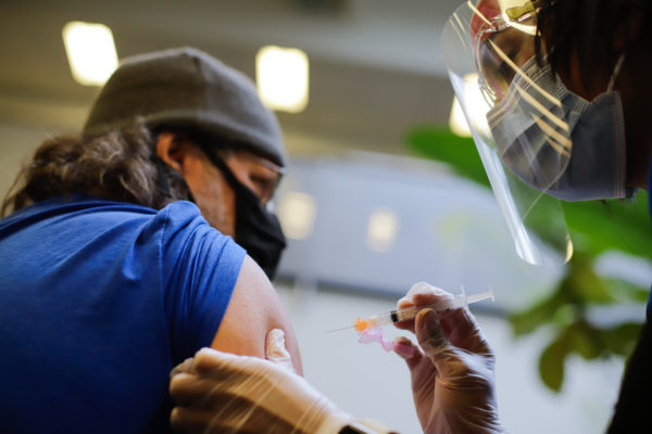 a person receives a vaccination