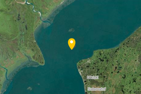 An image of water and land shows the location of a spill site, in the Cook Inlet.