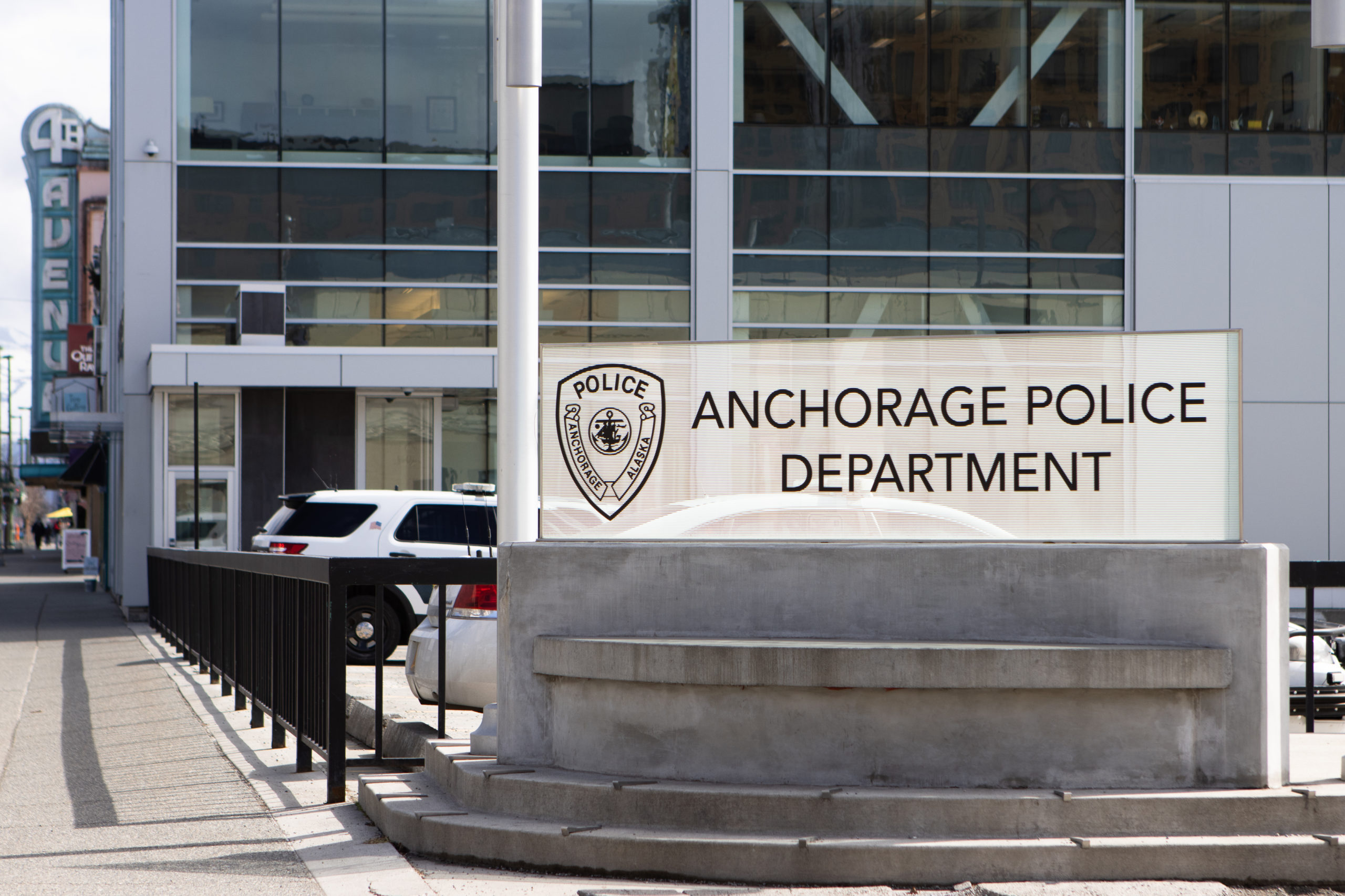 sign in front of building that says: anchorage police department