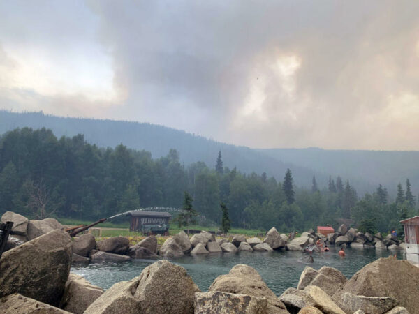 Thick smoke hangs over a hot springs resort.
