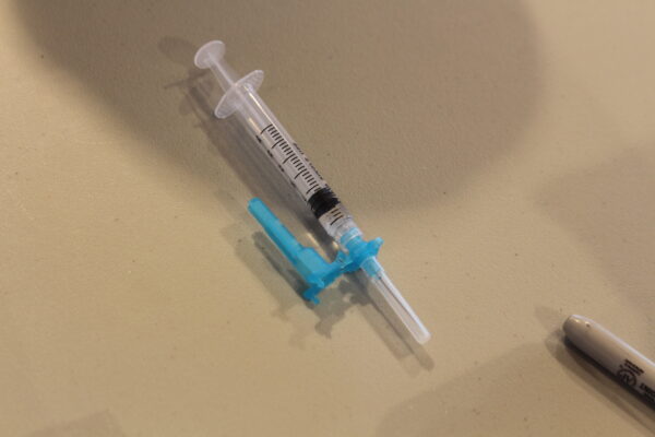A syringe on a table