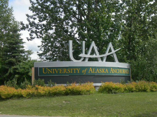 A large outdoor sign says UAA, University of Alaska Anchorage.