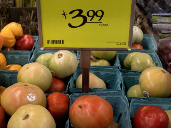 A $3.99 sign for tomatoes.
