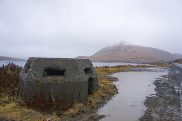 An old military structure near the water.
