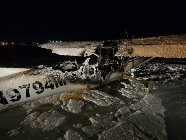 A burned and destroyed plane.