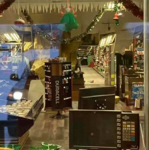 Roof collapse through the window of a grocery store