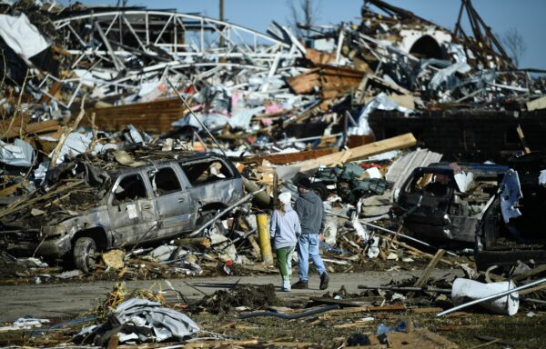 Crumpled cars, metal beams and other signs of destruction.