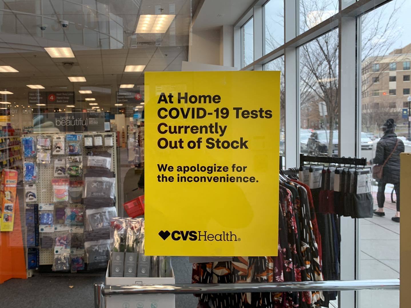 A sign says at-home COVID tests are sold out