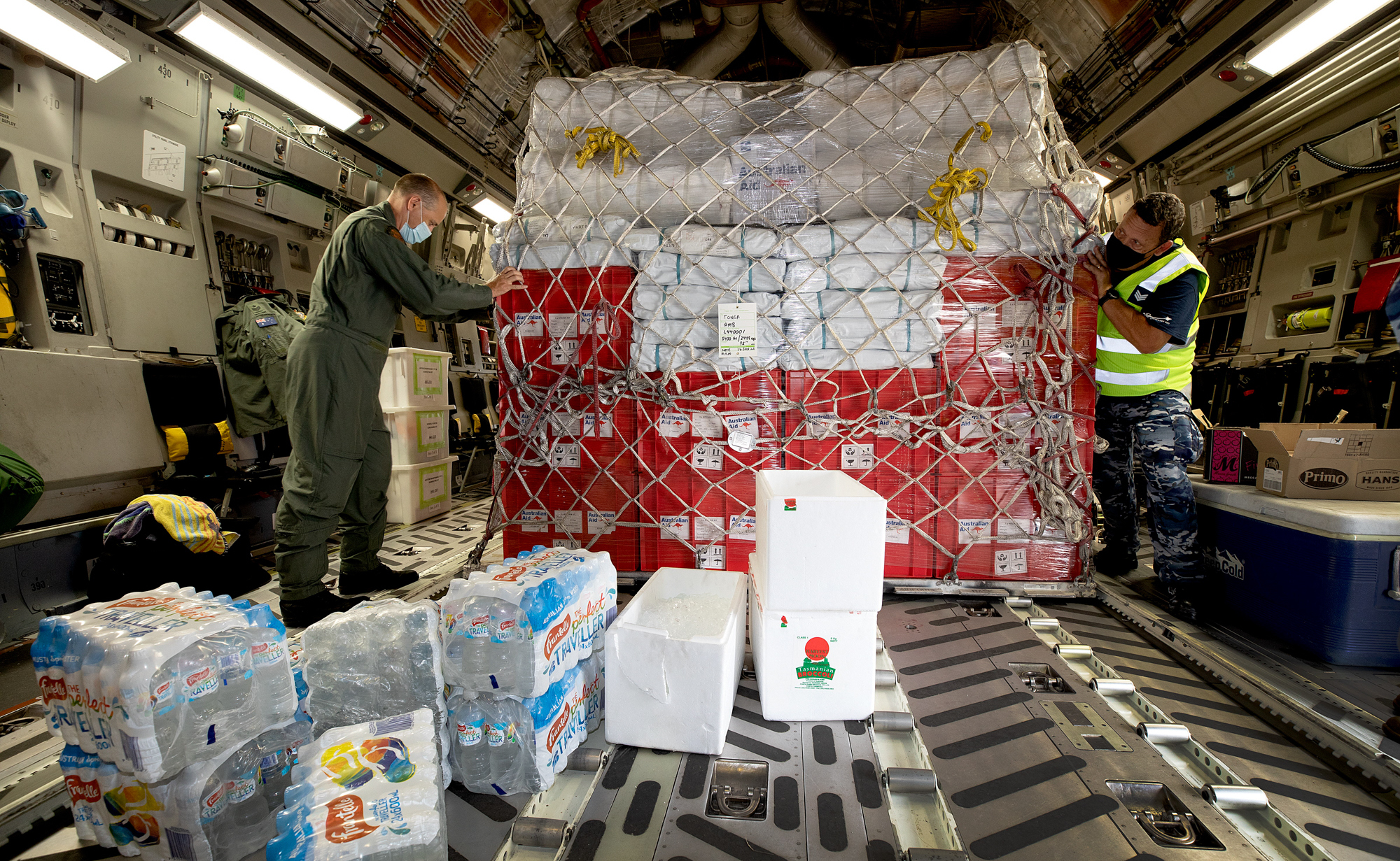 Supplies being secured in a huge plane