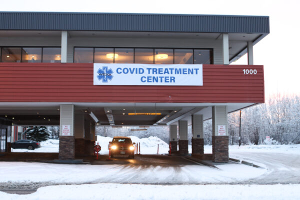 A car parked waiting for a Covid test at the former Golden Lion Hotel in Anchorage
