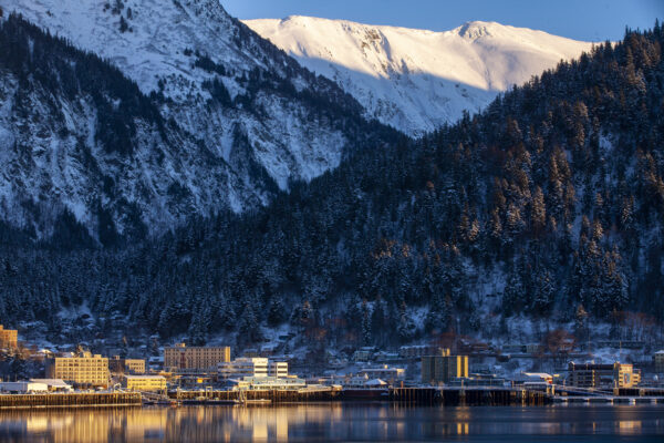 downtown Juneau seen from across the water at sunrise