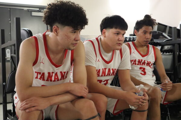 three members of a basketball team