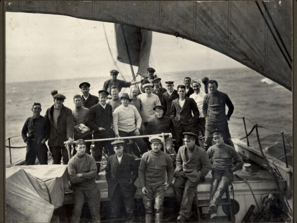 The Endurance's crew posing for a photo on the deck of the ship.