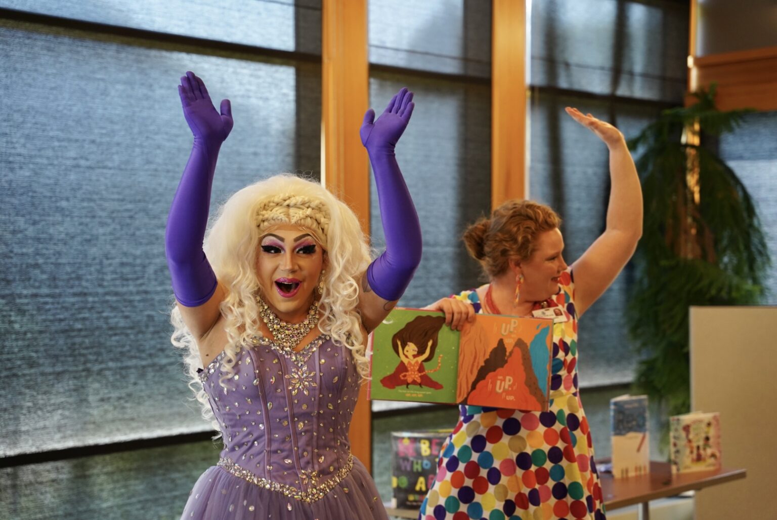 Drag queen performs lap dance on student and gyrates in front of cheering  children