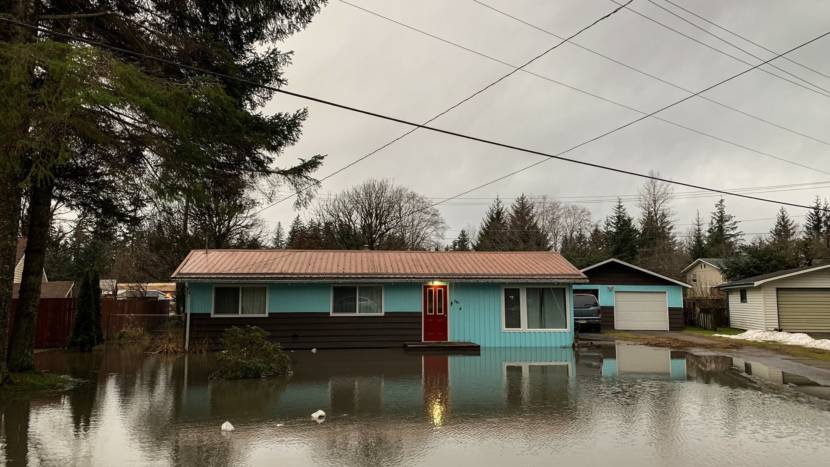 The exterior of a house being flooded