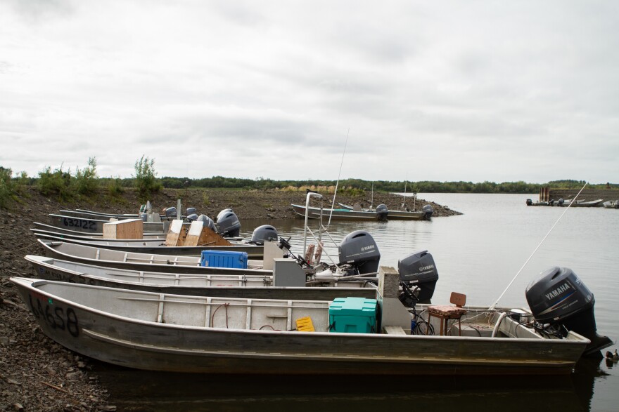 Exterior: Metal boats beached on a riverbank