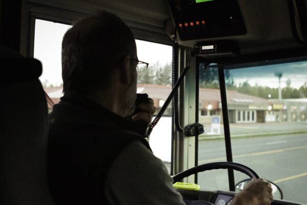 bus driver speaking in microphone