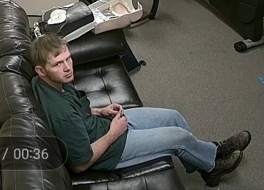 a man sitting on a couch