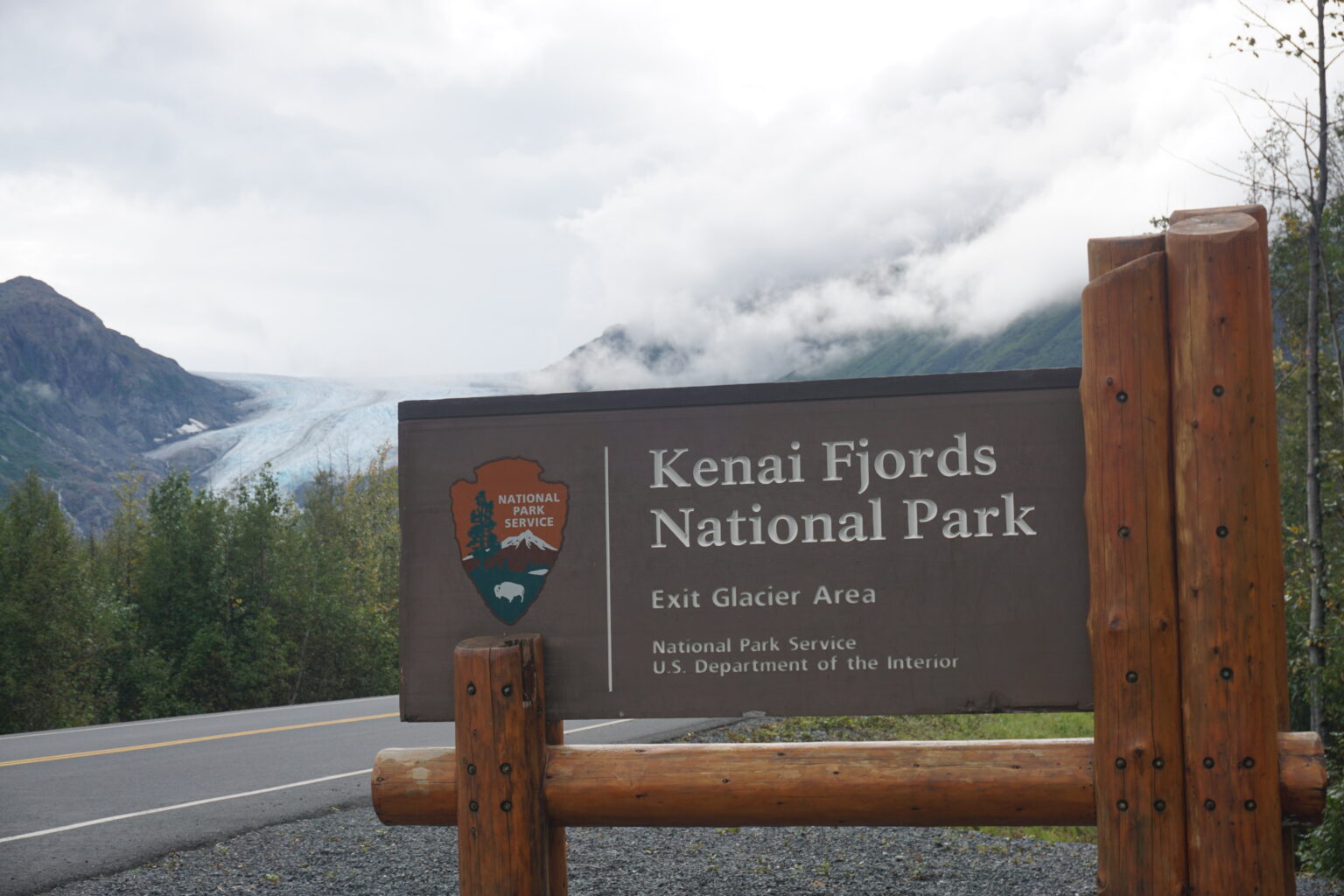 a sign says "Kenai Fjords National Park"