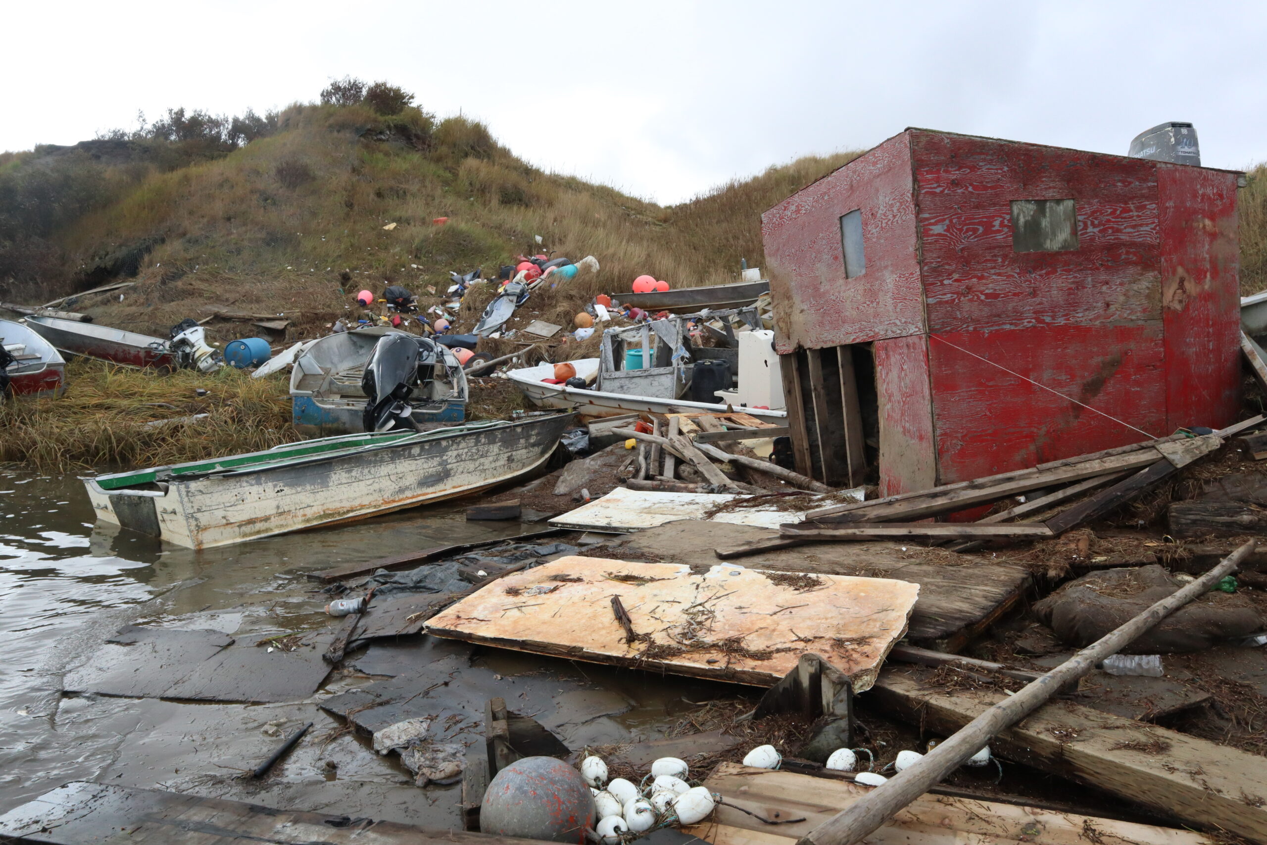 damaged boats and sheds in chevak