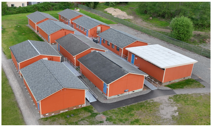 an aerial view of several portable, self contained buildings