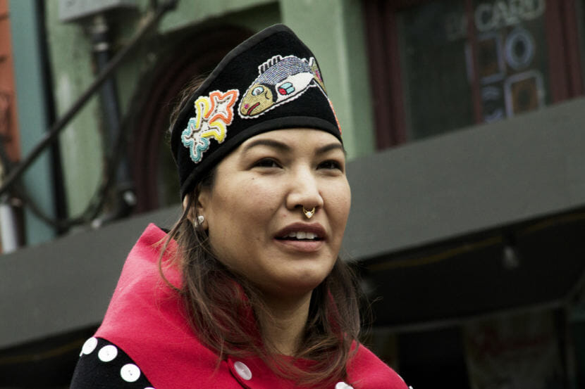 a woman in Alaska Native regalia