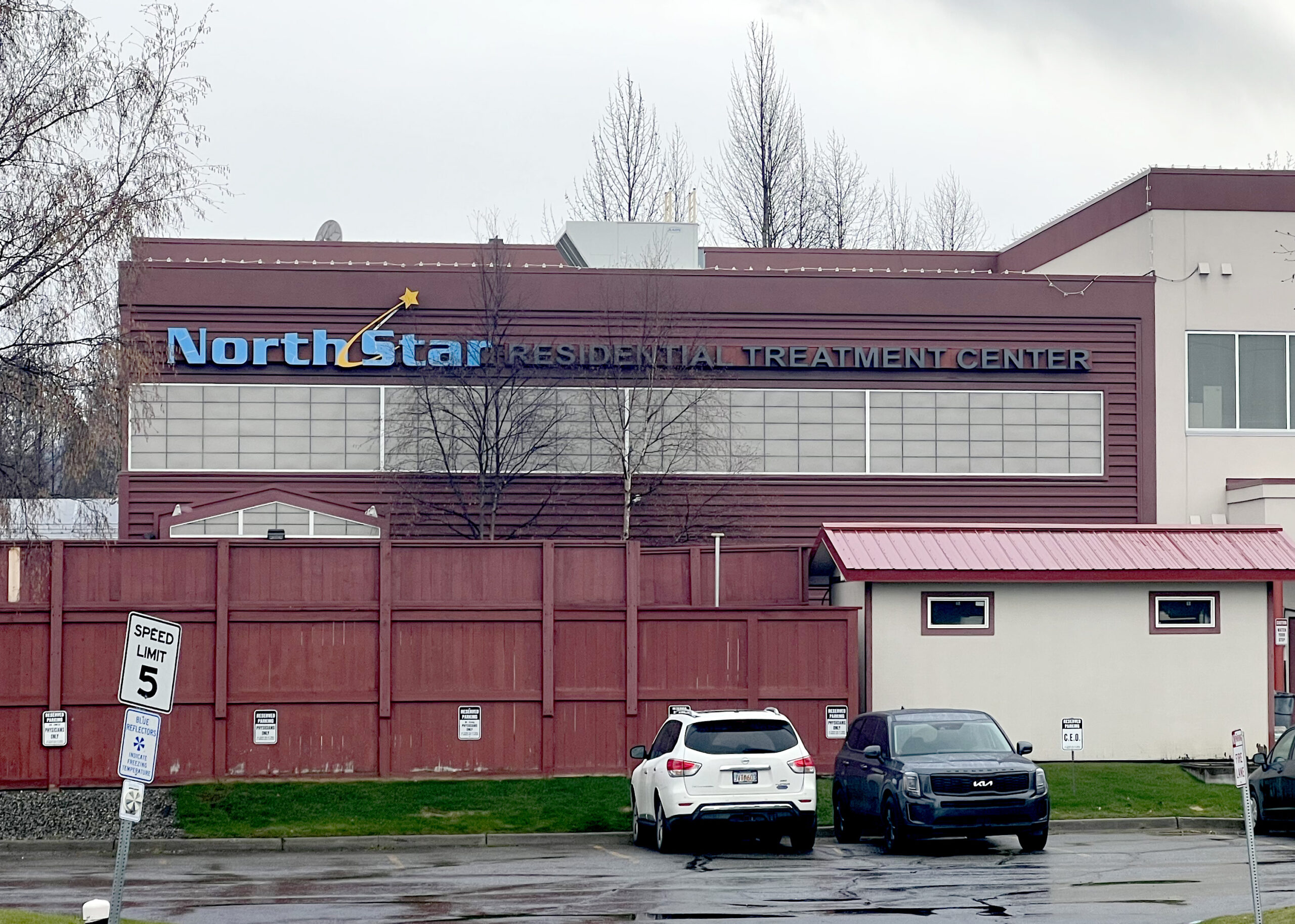 A maroon building with blue lettering that says "North Star Residential Treatment Center"