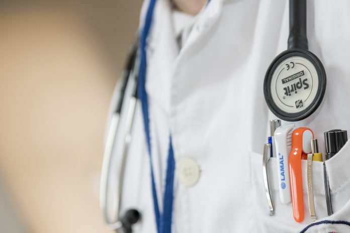 Close up of doctor's coat with stethoscope