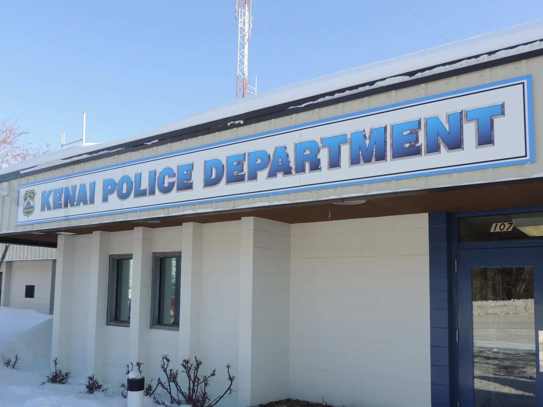 a building with a sign that says Kenai Police Department