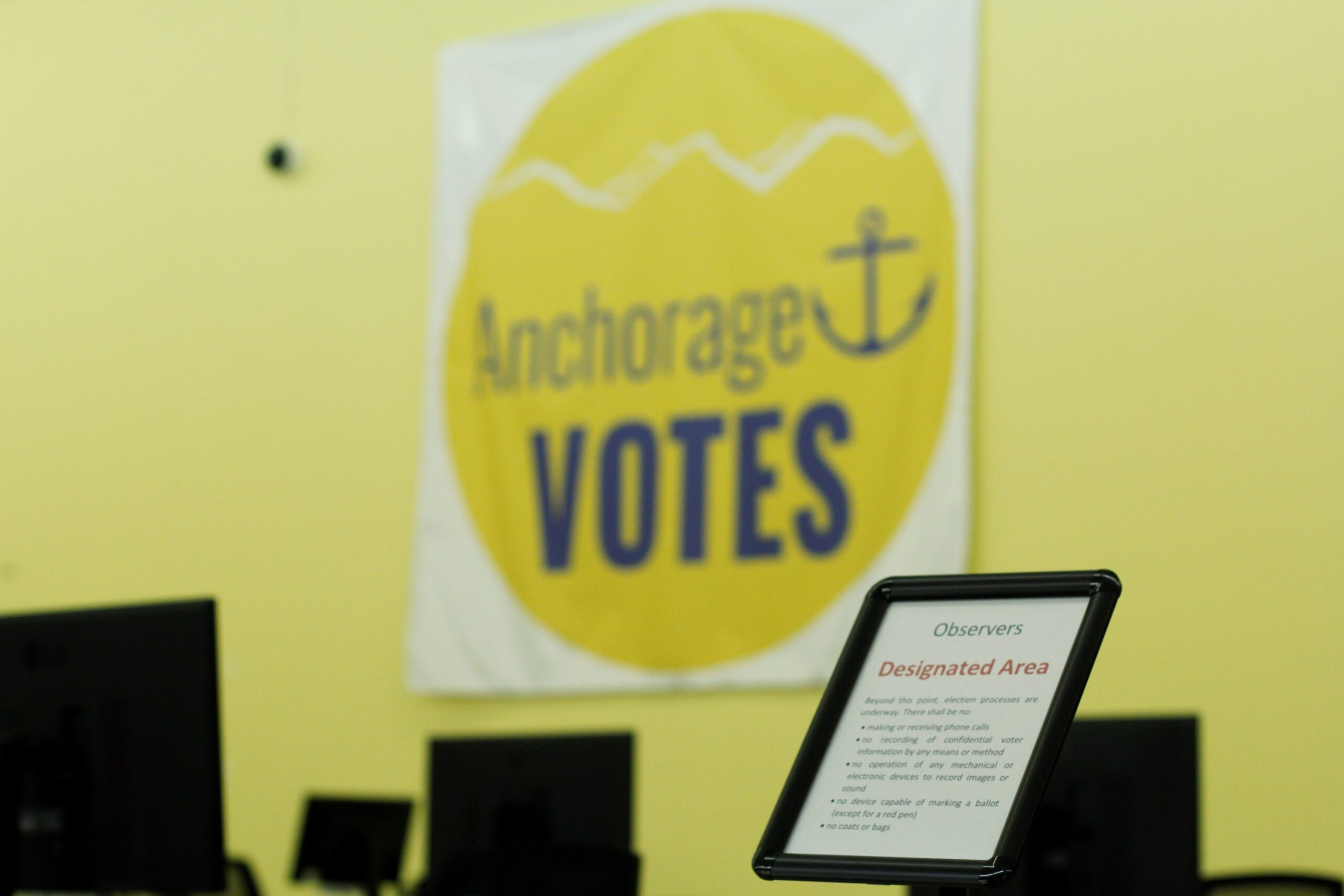 Anchorage Votes banner and election observer sign