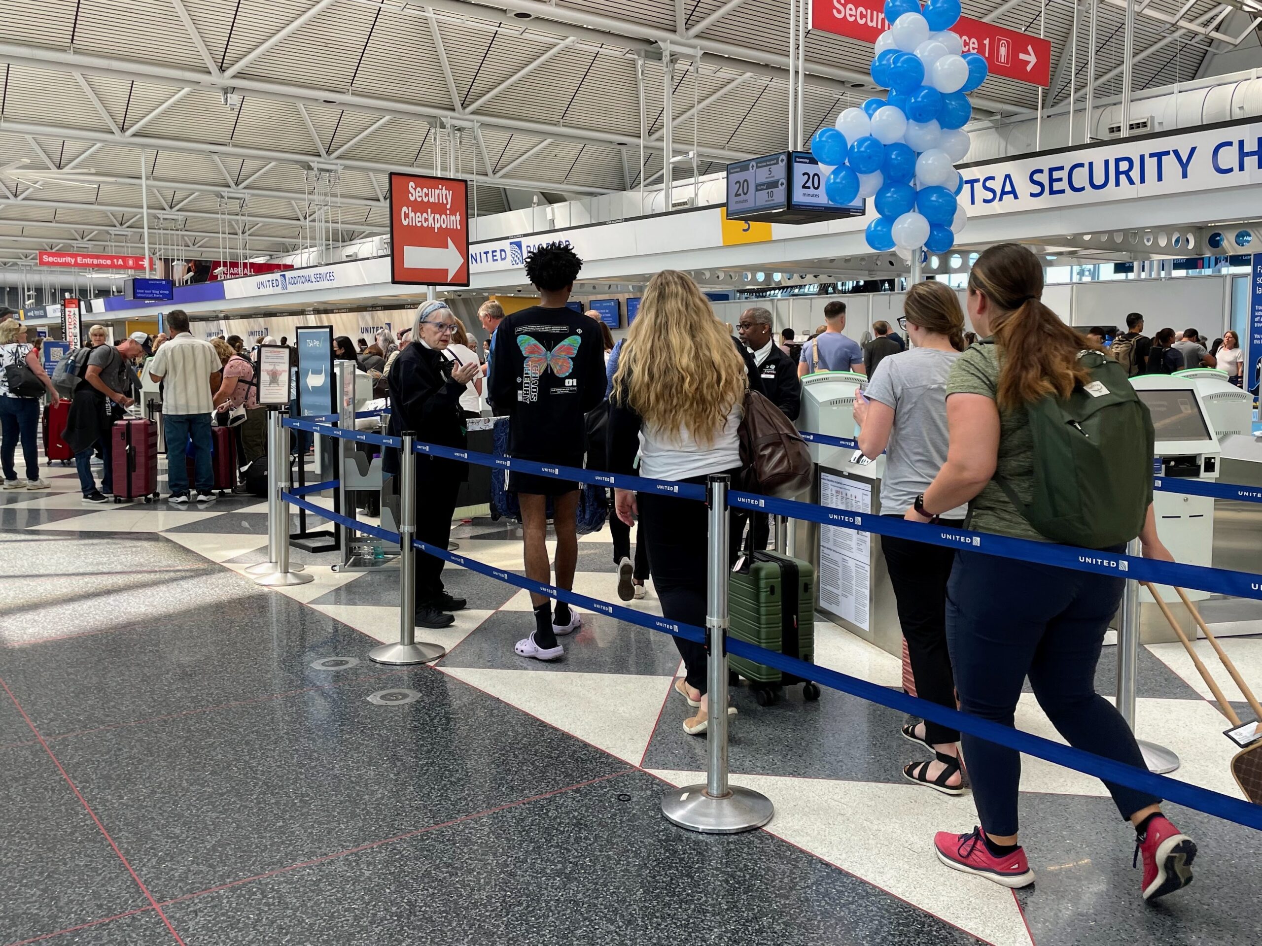 people in line at an airport