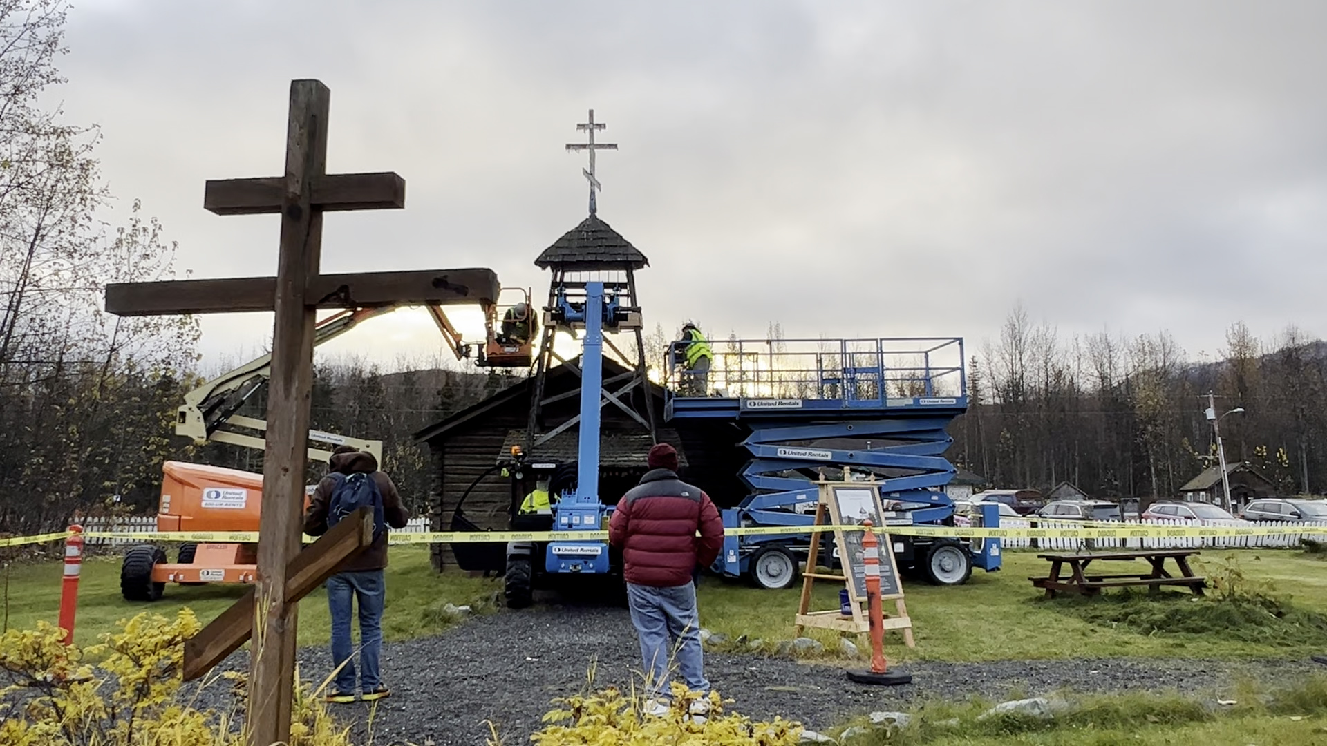 Workers are preparing to remove the old bell tower from the c.1870 Old St. Nicholas Russian Orthodox Church as the sun rises on Friday morning October 13, 2023