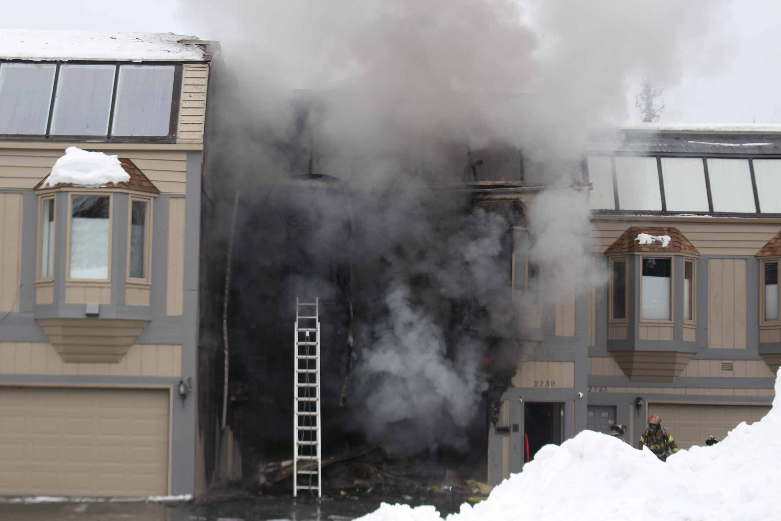 A condo fire is fought by Anchorage fire fighters.