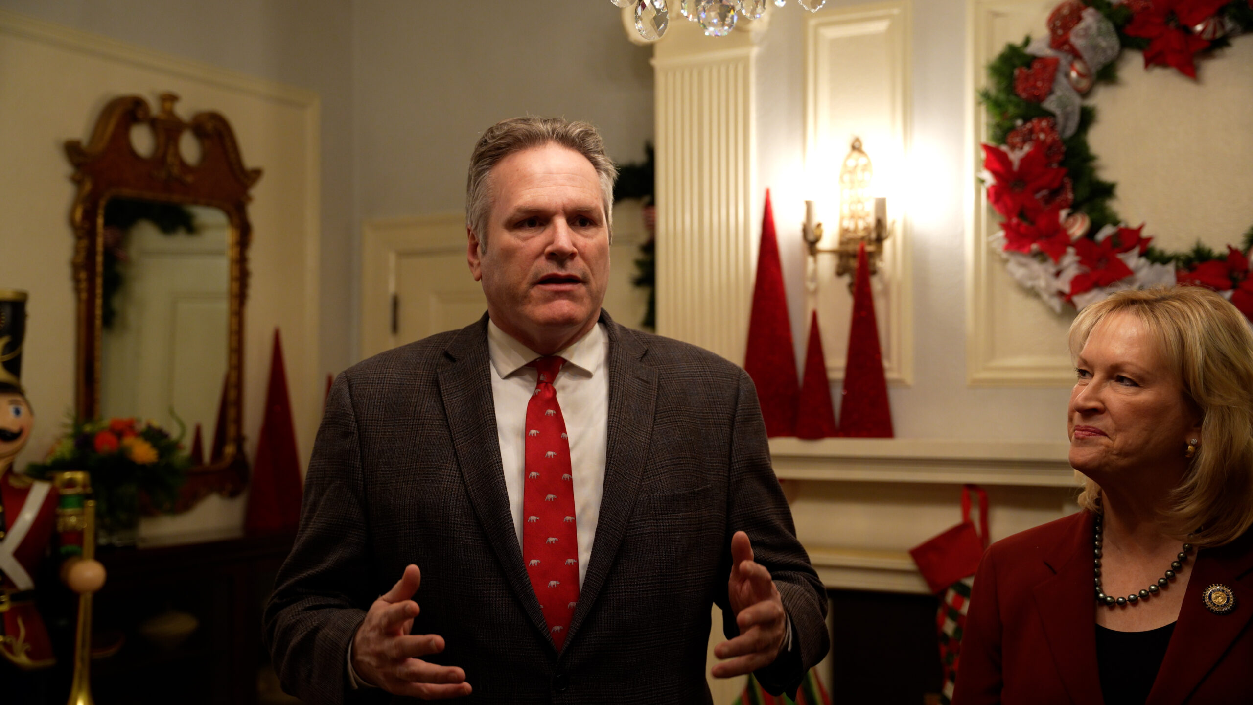 Governor Dunleavy gesturing while speaking