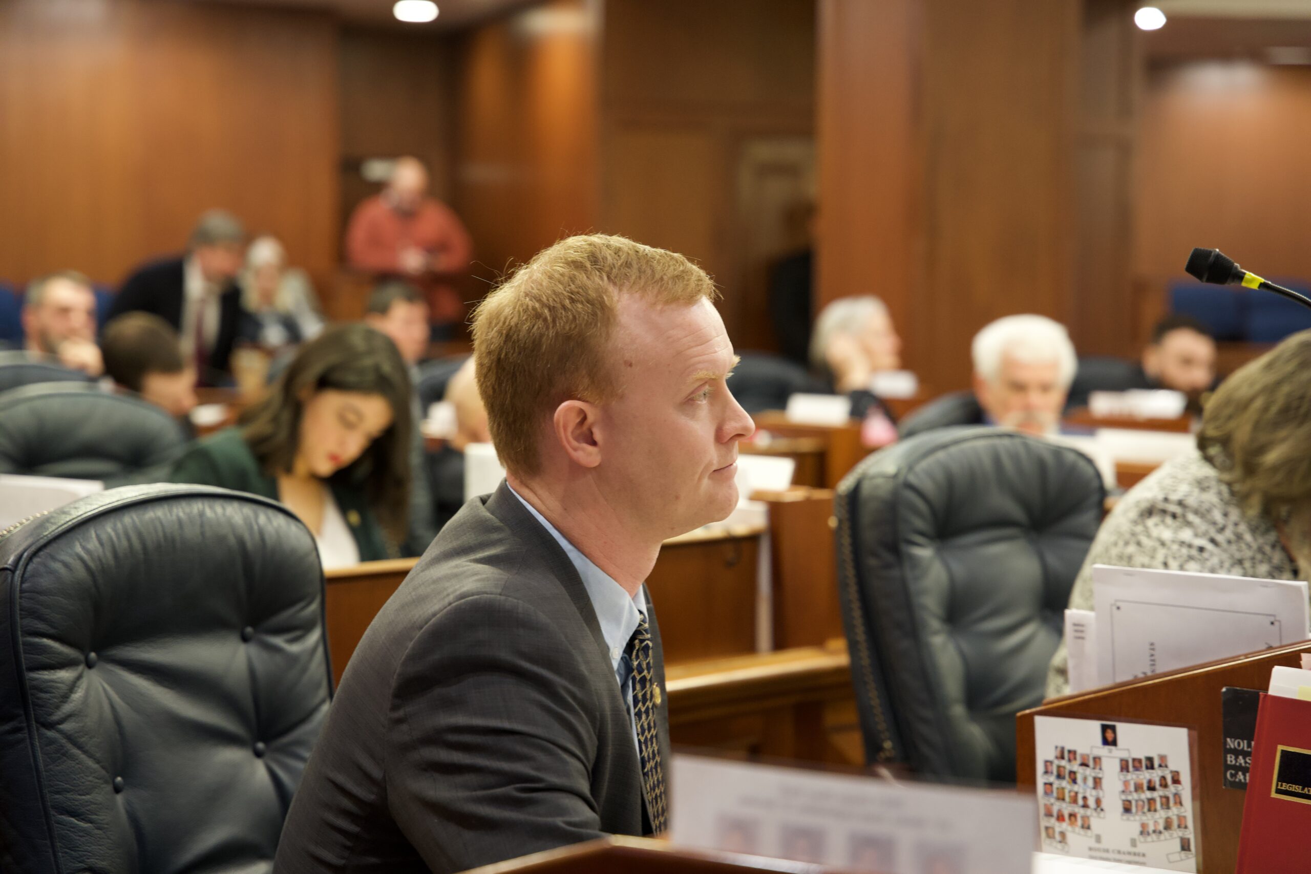 Representative David Eastman sitting in House chamber